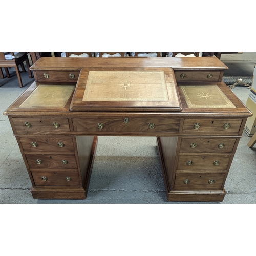 611 - A Victorian Leather Topped Mahogany Sloped Twin Pedestal Desk - 'W H Travers' Long Acre 85cm H x 138...