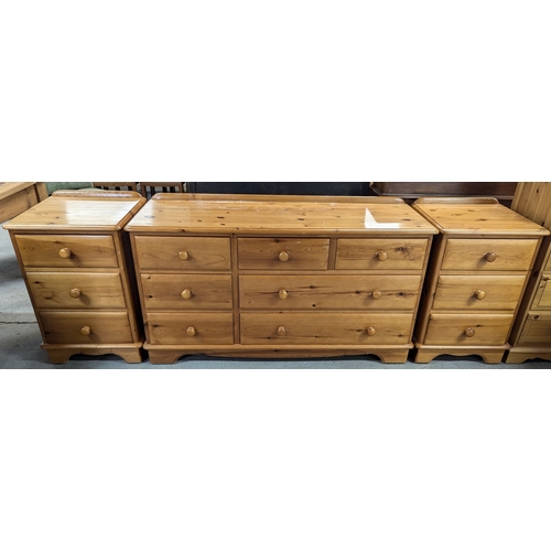 696 - A Lovelace Pine 7 Drawer Chest And 2 Bedside Cabinets - 132 x 74 x 46cm And 48 x 74 x 46cm Respectiv... 