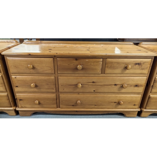 696 - A Lovelace Pine 7 Drawer Chest And 2 Bedside Cabinets - 132 x 74 x 46cm And 48 x 74 x 46cm Respectiv... 