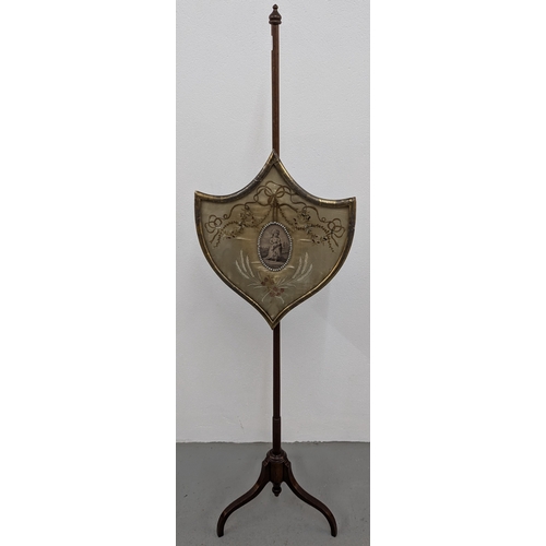 673 - .An Antique Mahogany Shield Pole Fire Screen