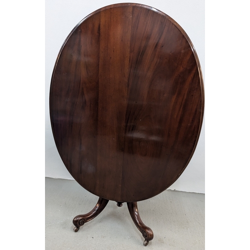 678 - .An Oval Tilt Top Mahogany Table - 120 x 95 x 74cm