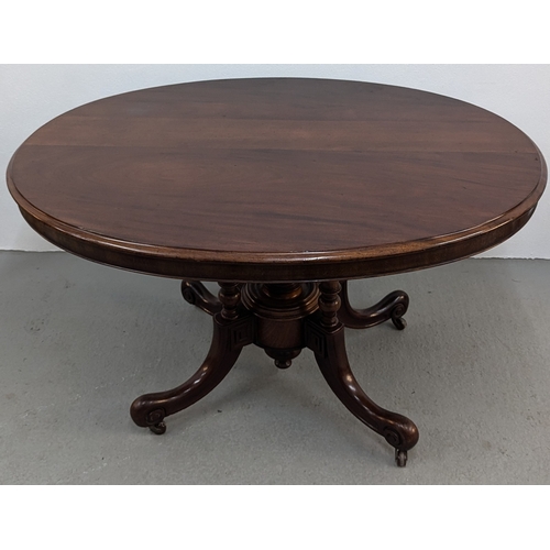 678 - .An Oval Tilt Top Mahogany Table - 120 x 95 x 74cm