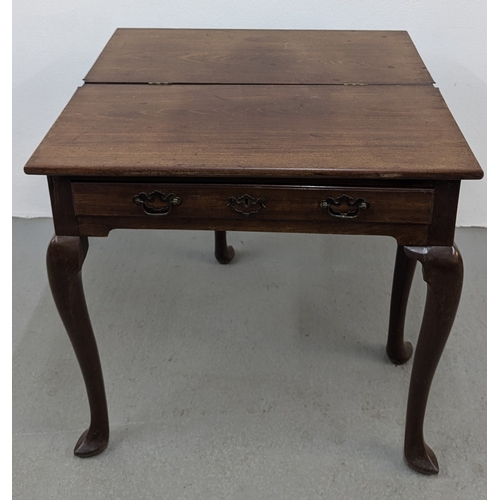 1111 - An Antique Foldover Top Tea Table