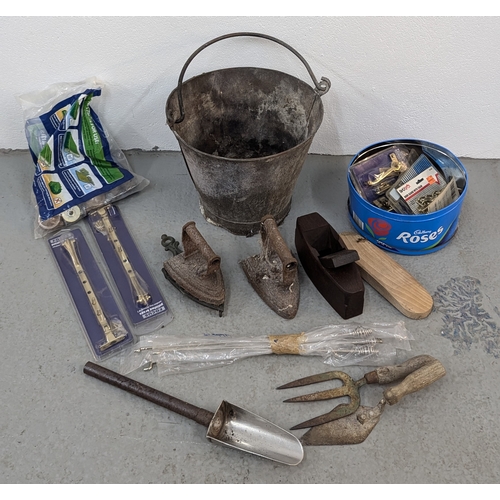 531 - .A Galvanised Pail full of Oddments and Ironmongery, Flat Irons,  Block Planes etc.