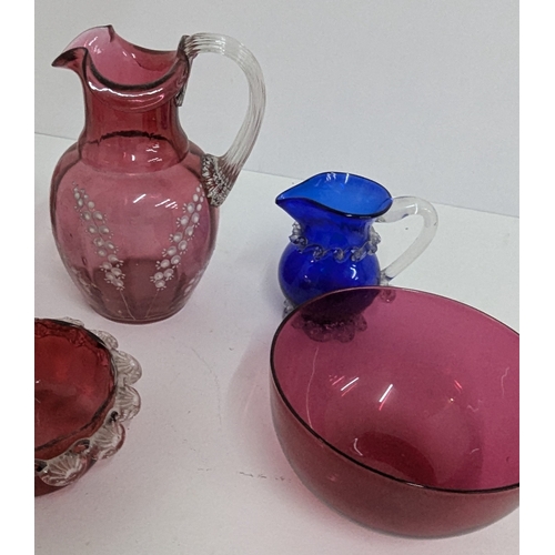 695 - .An Assortment of Cranberry and Blue Glassware