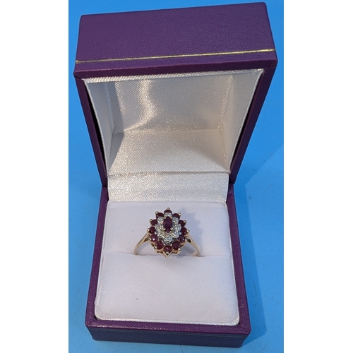 703 - A Ruby And Diamond 9ct Gold Ring. Size Q/r. Total Weight 2.4gms