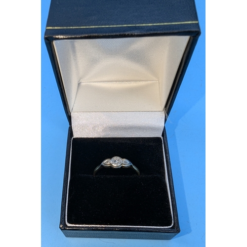 704 - An 18ct Gold - Unhallmarked But Tested - Three Stone Diamond Ring. Size P/Q