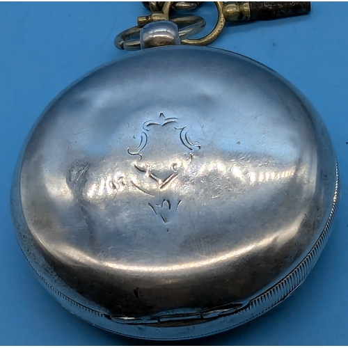 712 - A Silver Waltham Pocket Watch - Running