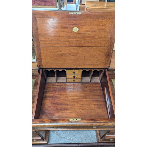 611 - A Victorian Leather Topped Mahogany Sloped Twin Pedestal Desk - 'W H Travers' Long Acre 85cm H x 138... 