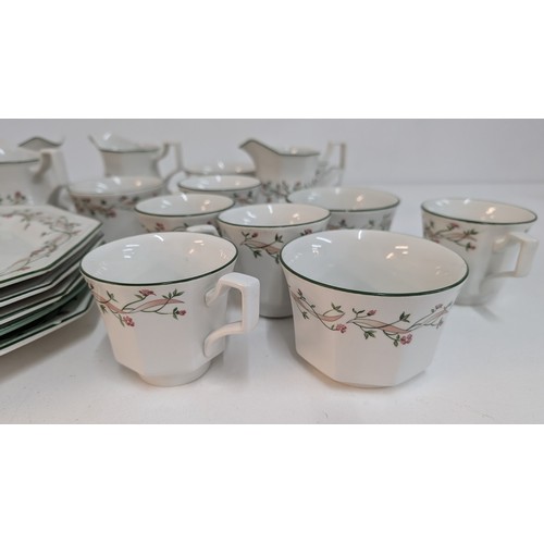 1424 - .A Collection of Eternal Beau China inc. 1 x Teapot, 4 x Dinner Plates, 6 x Cups, 4 x Sugar Bowls, 4... 