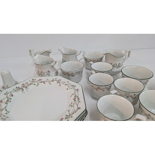 1424 - .A Collection of Eternal Beau China inc. 1 x Teapot, 4 x Dinner Plates, 6 x Cups, 4 x Sugar Bowls, 4... 