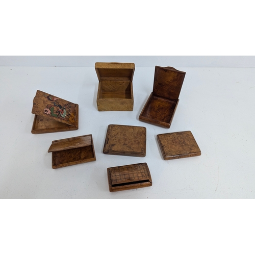 1148 - .A Collection of Antique Karelian Wood Cigarette Cases