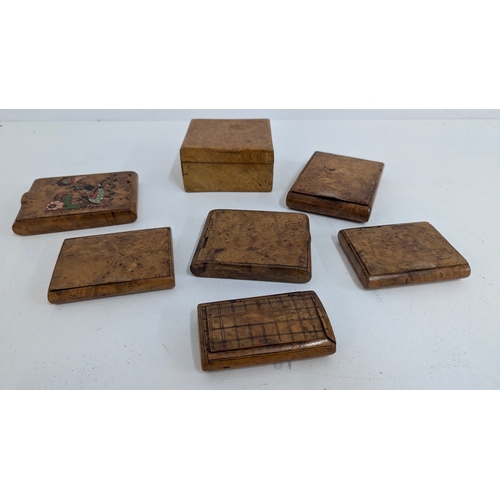 1148 - .A Collection of Antique Karelian Wood Cigarette Cases