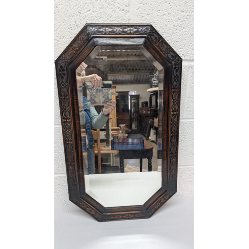 1284 - .A Carved Wood Bevelled Glass Mirror - 75 x 44cm