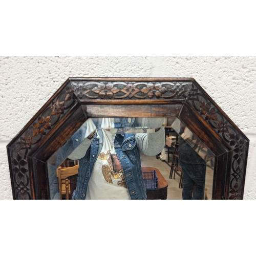 1284 - .A Carved Wood Bevelled Glass Mirror - 75 x 44cm