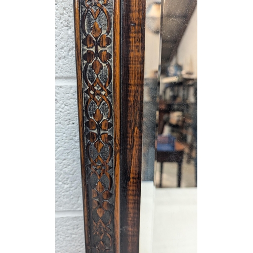 1284 - .A Carved Wood Bevelled Glass Mirror - 75 x 44cm