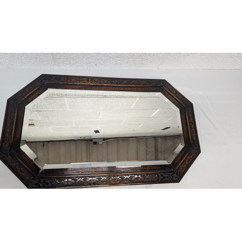 1284 - .A Carved Wood Bevelled Glass Mirror - 75 x 44cm