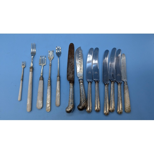 31 - An Assortment of Silver Handled Knives & Pickle Forks etc