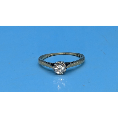 617 - An 18ct Gold Diamond Size L/M .33 H.vsi. Solitaire Ring in Platinum Setting