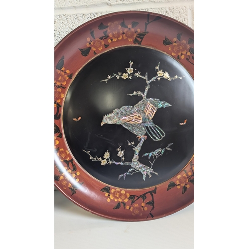 788 - An Antique Pair of Japanese Black Lacquerware. Mother of Pearl & Wooden Design Wall Hanging Plates w... 