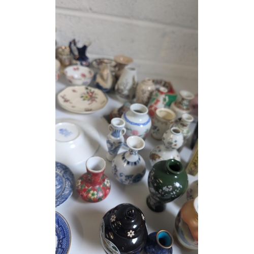 793 - A collection of Antique & vintage Miniature China & Porcelain Items including Spode, Royal Crown Der... 