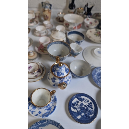 793 - A collection of Antique & vintage Miniature China & Porcelain Items including Spode, Royal Crown Der... 