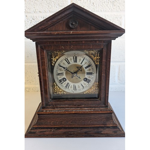 743 - Antique Solid Wood Mantle Clock with Key in good condition with dust!