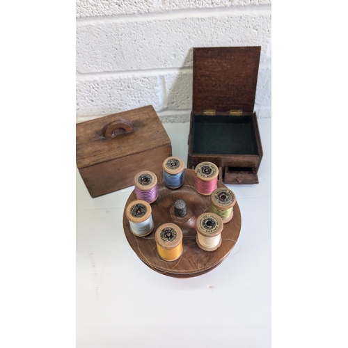 704 - Vintage Wooden Cotton Reel Holder with White Metal thimble and Reels, A Wooden Cigarette Box and ano... 