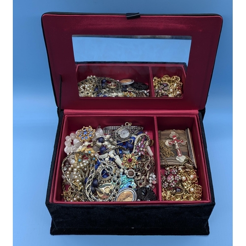 670 - A Jewellery Box And Contents