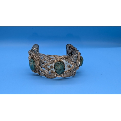 684 - An Egyptian White Metal Bracelet Decorated With Scarab Beetle