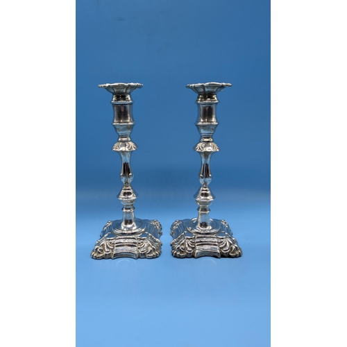 70 - A Pair Of Ornate Hallmarked Silver Clay Filled Candlesticks - 1160gms Total Weight