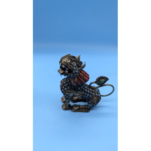 78 - A Pair Of Tibetan Container Foo Dog Snuff Bottles