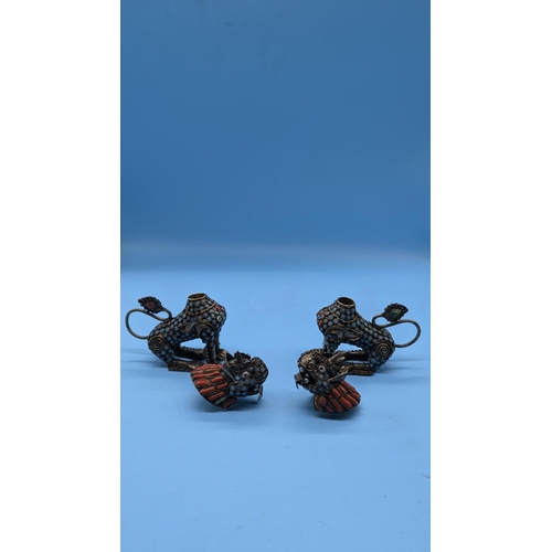 78 - A Pair Of Tibetan Container Foo Dog Snuff Bottles