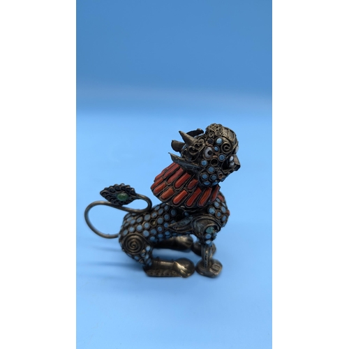 78 - A Pair Of Tibetan Container Foo Dog Snuff Bottles