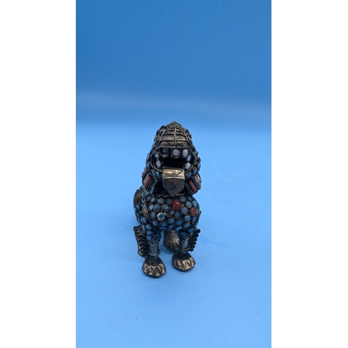 78 - A Pair Of Tibetan Container Foo Dog Snuff Bottles