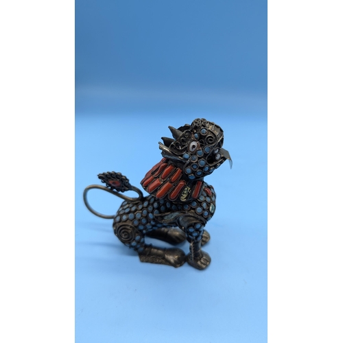 78 - A Pair Of Tibetan Container Foo Dog Snuff Bottles