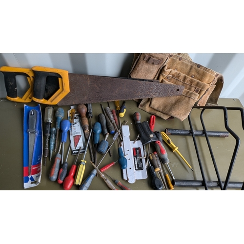 1112 - A Box of Assorted Screwdrivers, Plasterboard Mates, Door Stand Tool Belt and Handsaws