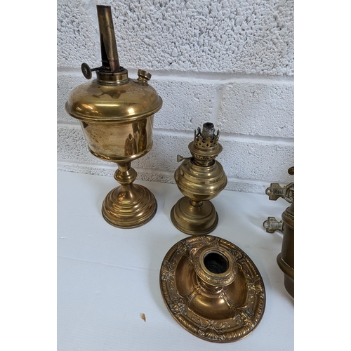 896 - Wall Hanging Brass Oil Lamp And Other Brassware, Candle Holder, Column Lamp Etc.