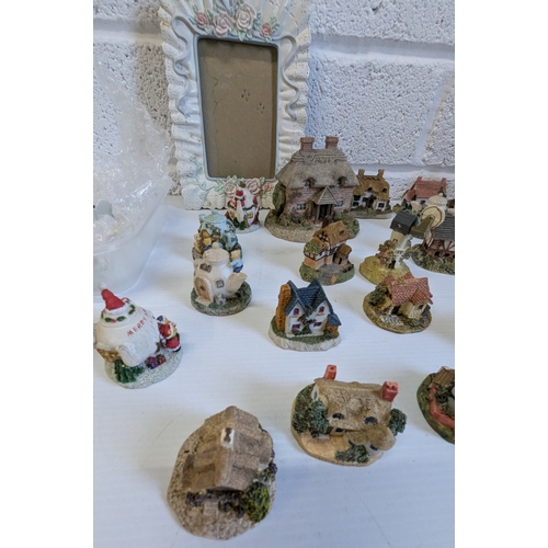 945 - A Large Quantity Of Collectable Miniature Coffee And Teapot Ornaments Etc.