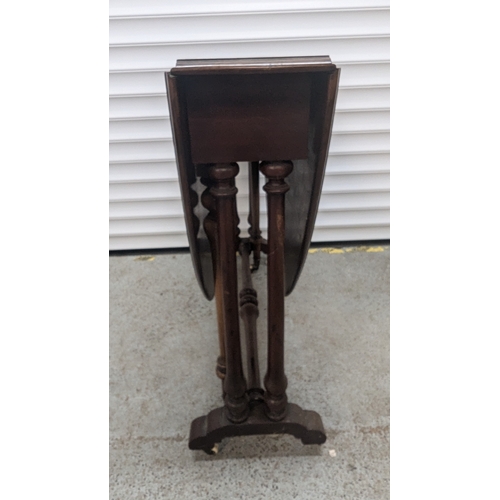 1303 - Gate Leg Table With Turned Columns & Stretcher On Ceramic Castors - 74 x 30 (closed) 123 (open) x 92... 