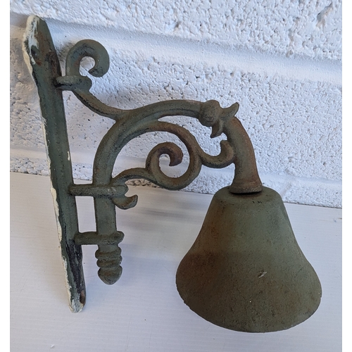 1390 - Vintage Cast Iron Wall Mounted Dinner Bell