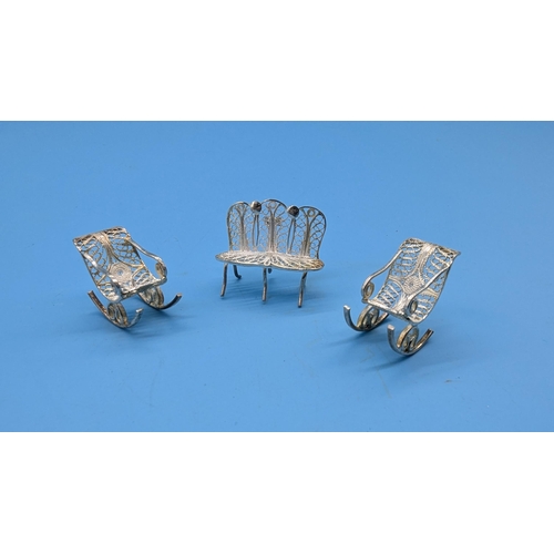 56 - A Filigree Silver Miniature Novelty Rocking Chair and Sofa