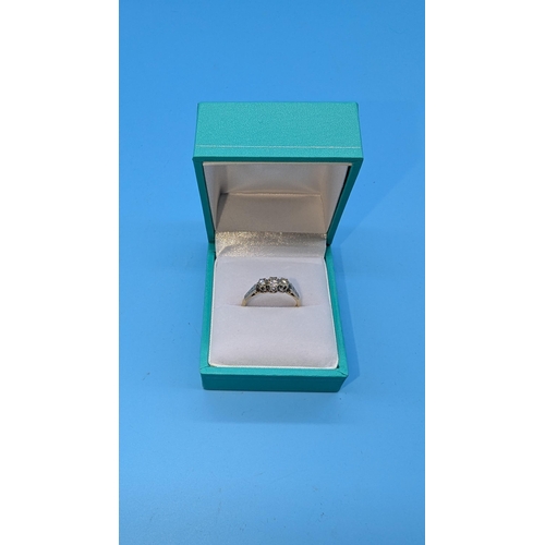 634 - An 18ct Gold and Diamond Trilogy Ring in Platinum Setting Size O/P