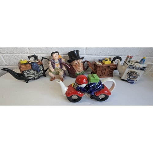 1308 - Collection Of Novelty Teapots And Jugs, Including Washing Machine Toby Jug, Motorbike And More