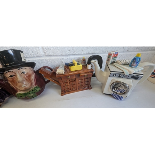 1308 - Collection Of Novelty Teapots And Jugs, Including Washing Machine Toby Jug, Motorbike And More