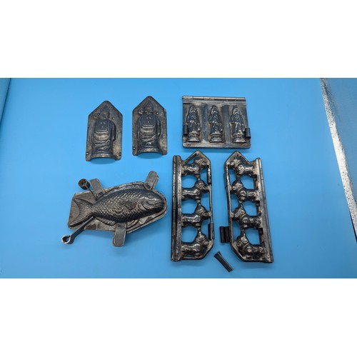 701B - A Collection Of Antique Chocolate Moulds