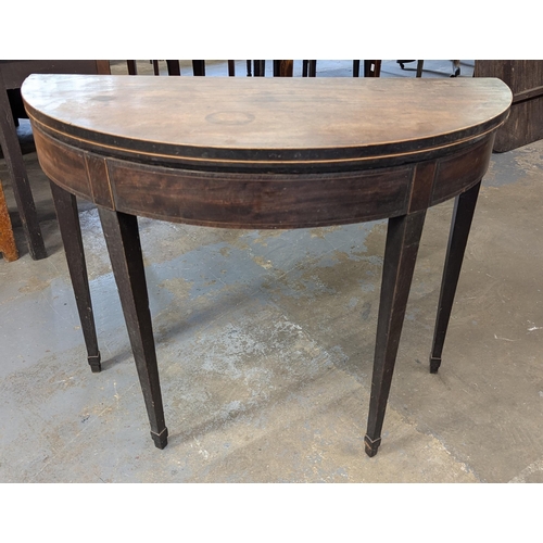 582 - A Demi Lune Folding Table