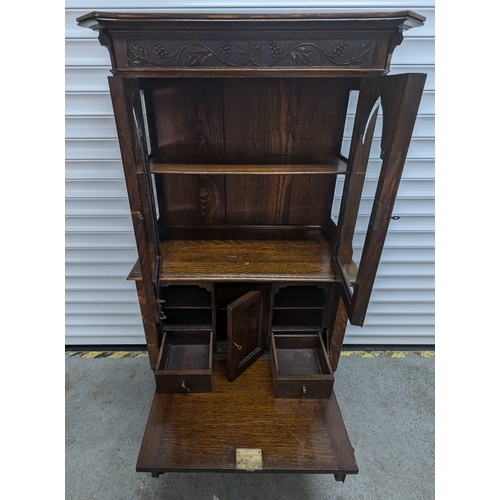 1325 - A Carved Oak Secretaire