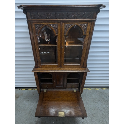 1325 - A Carved Oak Secretaire