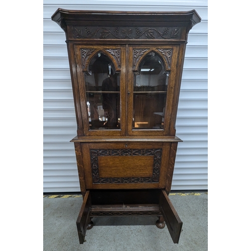 1325 - A Carved Oak Secretaire